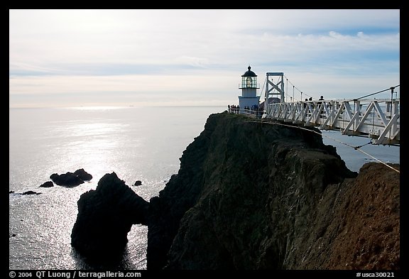 Narrow bridge leading to the Point Bonita Lighthouse, afternoon. California, USA (color)