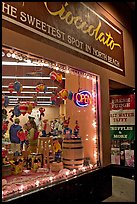 Chocolate store on Columbus Avenue at night, North Beach. San Francisco, California, USA (color)