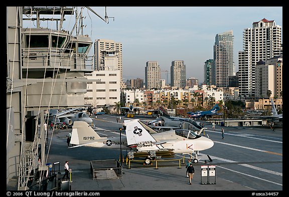 Flight control tower, aircraft, San Diego skyline, USS Midway aircraft carrier. San Diego, California, USA (color)