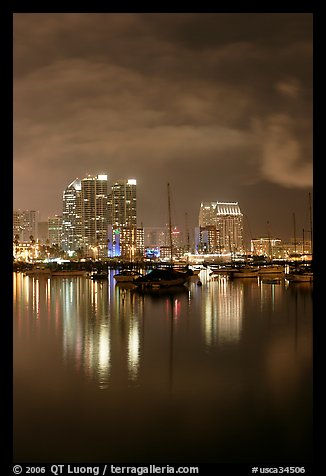 Yachts and skyline from Harbor Drive, at night. San Diego, California, USA
