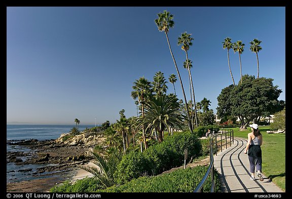Woman jogging in Heisler Park, next to Ocean. Laguna Beach, Orange County, California, USA (color)