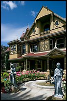 Statues, fountain, and facade. Winchester Mystery House, San Jose, California, USA ( color)