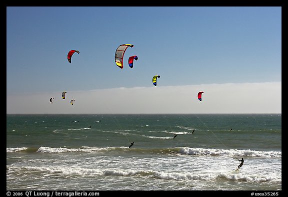 Group of kitesurfers, Waddell Creek Beach. California, USA