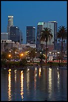 Skyline reflected in a lake in Mc Arthur Park. Los Angeles, California, USA