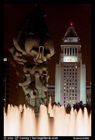 Peace on Earth sculpture, fountain, and City Hall at night. Los Angeles, California, USA (color)