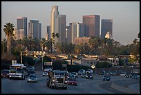Traffic on freeway and skyline, early morning. Los Angeles, California, USA ( color)