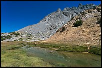 Stream and colorful rocks on Inconsolable Range. California, USA
