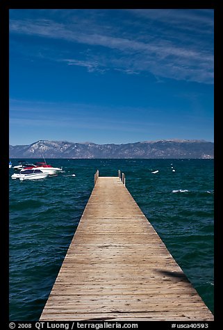 Dock, small boats, and blue waters, West shore, Lake Tahoe, California. USA
