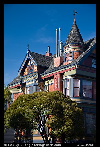 Red victorian house, Haight-Ashbury District. San Francisco, California, USA