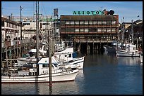 Aliotos restaurant and fishing fleet, Fishermans wharf. San Francisco, California, USA