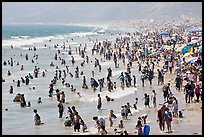 Crowds of beachgoers in water. Santa Monica, Los Angeles, California, USA ( color)