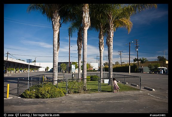 Girl and people park, Bergamot Station arts center. Santa Monica, Los Angeles, California, USA (color)