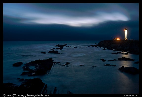 Night coastal scene with ocean and Lighthouse, Point Arena. California, USA (color)