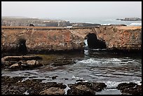 Sea cliffs with sea arches. California, USA