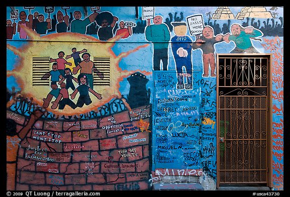 Political mural and door, Mission District. San Francisco, California, USA