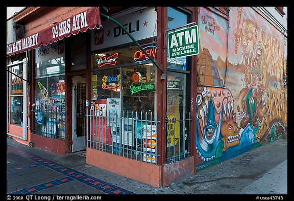 Corner store and mural, Mission District. San Francisco, California, USA