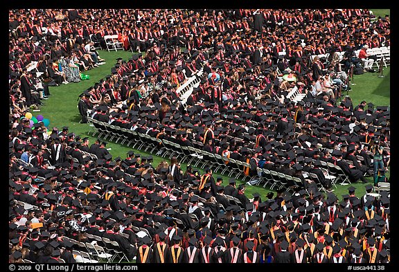Large gathering of students in academic dress at graduation ceremony. Stanford University, California, USA