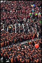 Dense rows of graduating college students in academic heraldy. Stanford University, California, USA