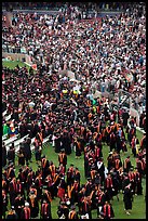Graduates gather in front of family and friends after commencement. Stanford University, California, USA