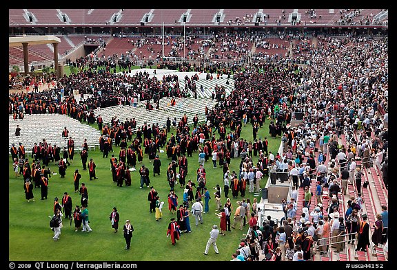 Audience and graduates mingling in stadium after commencement. Stanford University, California, USA