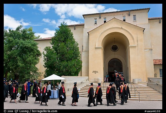 Graduates walking single file into Memorial auditorium. Stanford University, California, USA