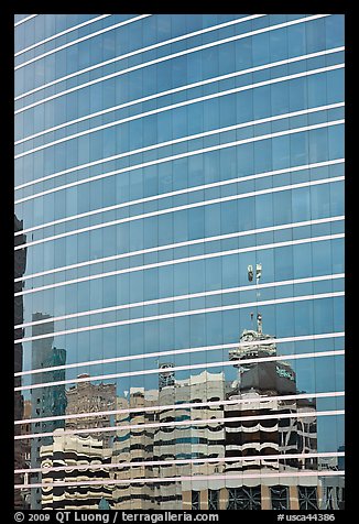 Federal building reflected in glass facade. Oakland, California, USA (color)