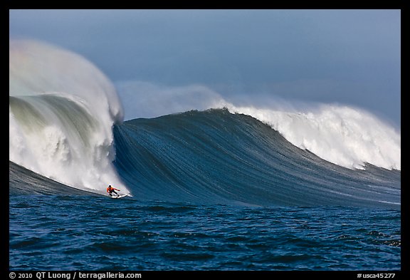 Surfing big wave at the Mavericks. Half Moon Bay, California, USA (color)