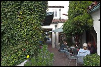 Cafe terrace in alley. Carmel-by-the-Sea, California, USA