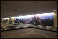 Baggage claim area with Yosemite murals, Fresno Yosemite Airport. California, USA ( color)