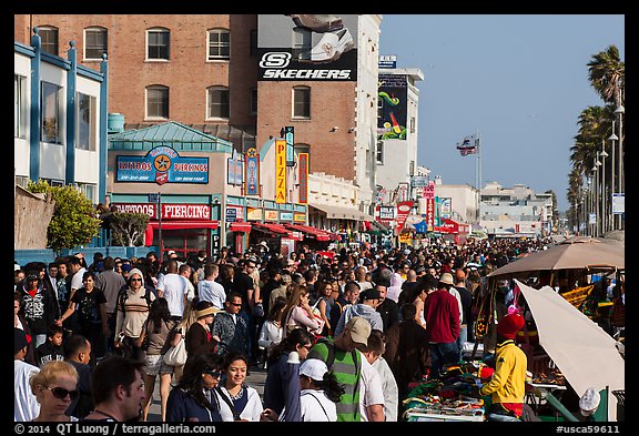 Ocean Front Walk with throngs of people. Venice, Los Angeles, California, USA (color)