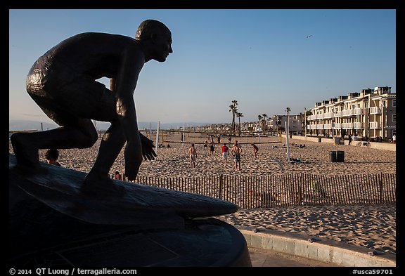 Statue of surfer and lifeguard Tim Kelly, Hermosa Beach. Los Angeles, California, USA (color)