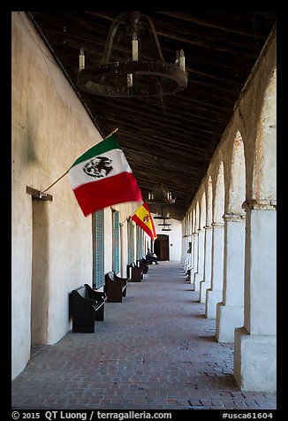 Outside arcade with Mexican and Spanish flags. California, USA (color)