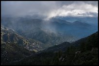 Rolling peaks under storm sky with shaft of light. San Gabriel Mountains National Monument, California, USA ( color)