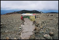Snow Mountain West Summit marker with Tibetan prayer flags. Berryessa Snow Mountain National Monument, California, USA ( color)