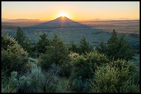 Whitney Butte with sun setting. Lava Beds National Monument, California, USA ( color)