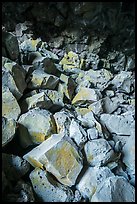 Colored rocks from collapsed ceilling, Big Painted Cave. Lava Beds National Monument, California, USA ( color)