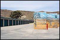 Self-storage units with Joshua trees, Yucca Valley. California, USA ( color)