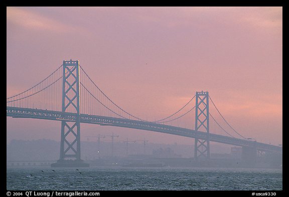Bay Bridge seen from Treasure Island, sunset. San Francisco, California, USA (color)