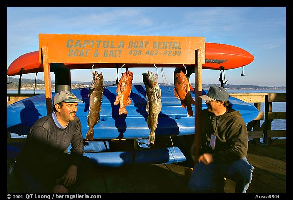 Fishermen with caught fish, Capitola. Capitola, California, USA (color)
