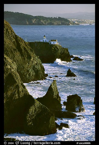 Cliffs and Point Bonita Lighthouse, late afternoon. California, USA (color)