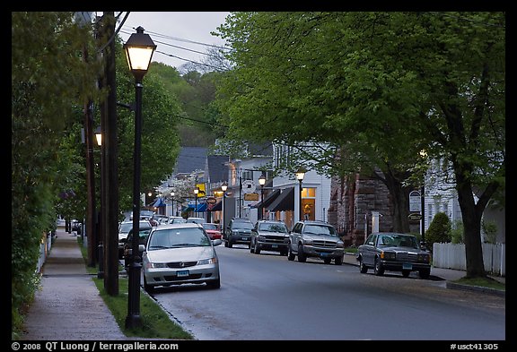 Street and storefronts at dusk, Essex. Connecticut, USA (color)