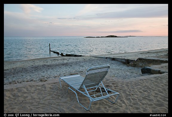 Beach chair at sunset, Westbrook. Connecticut, USA