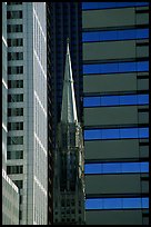 Church spire and modern buildings. Chicago, Illinois, USA (color)