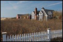 Fence and cottages in winter, Truro. Cape Cod, Massachussets, USA (color)