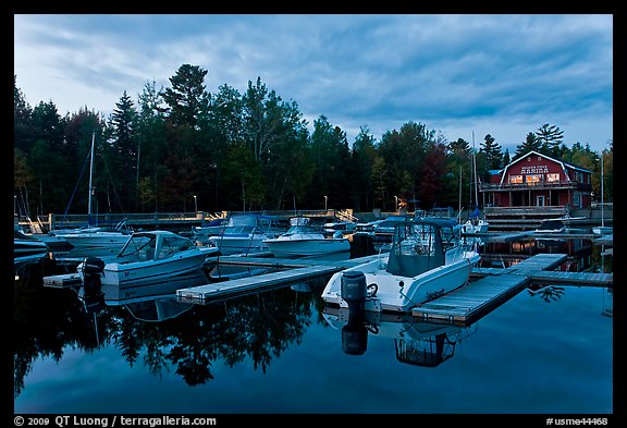 Boats in Beaver Cove Marina at dusk, Greenville. Maine, USA (color)