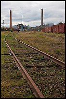 Railroad tracks and smokestacks, Millinocket. Maine, USA (color)