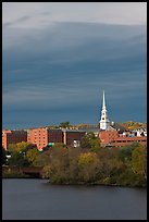 White steepled church and brick buildings. Bangor, Maine, USA (color)