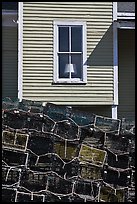 Lobster traps and window. Stonington, Maine, USA (color)