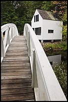 White wooden bridged and house. Maine, USA