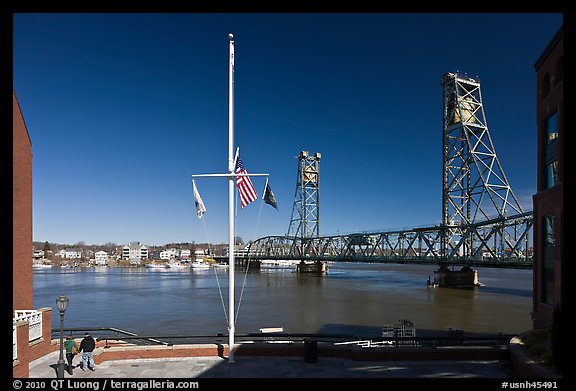 Riverside plaza, flagpole, and memorial bridge. Portsmouth, New Hampshire, USA